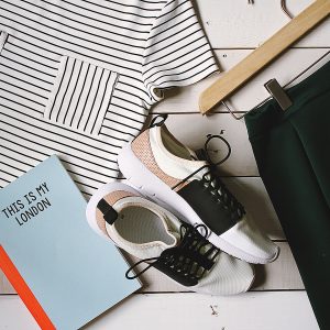 Women's outfit laid out with accessories
